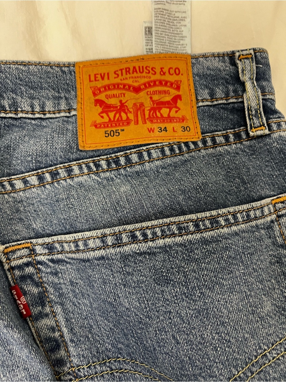 Levi's 505 Light Blue Slim Straight Jeans with Leather Patch